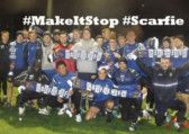 Halifax RLFC backs the #MakeItStop campaign by posing for a #Scarfie