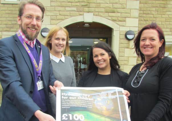 Forget Me Not Children's Hospice's Jason Costello with Provide Education's Nicola France, Paula Ho and Katie Buckle
