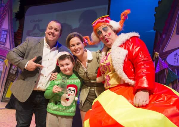 Courier Champion Children Awards at The Victoria Theatre, Halifax. Award winner Adam Robinson, nine, on stage with host Neil Hurst, Felicity Skiera as Jack, and Steve Fortune as Dame Trot.