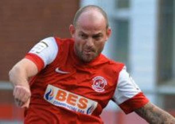 Jamie Milligan playing for Fleetwood Town