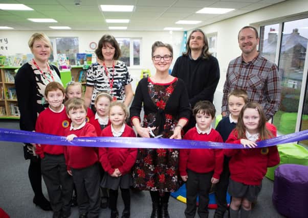 Opening of the new build library by author Lynne Chapman, pictured with HT Naomi Wood, Stephanie Hainsworth, architects Mike Middleton and Rick Sweetnam and children, at St Andrew's Infant School, Hove Edge, Brighouse