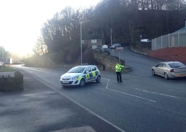Police have closed  off Elland Road in Brighouse following a fatal  crash