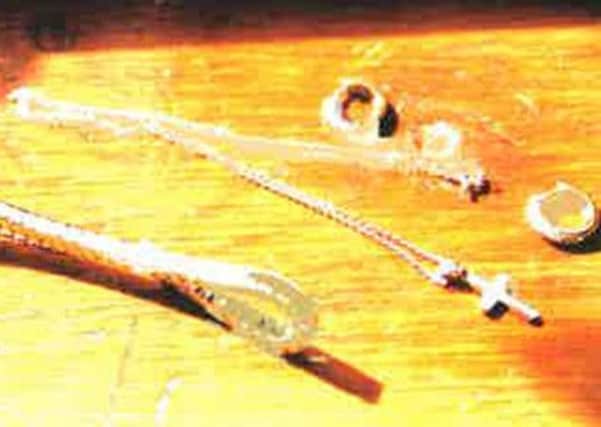 A diamond encrusted cross and diamond encrusted earrings; and an 18 carat white gold diamond stolen from an address in Todmorden on December 30