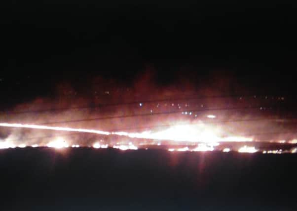 Stephen Wrathall sent in this photograph of the fire in Blackstone Edge.