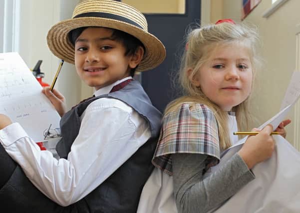 Edwardian Day at Hipperholme Grammar Junior School. Lakshya Kaushik aged seven and Emily Taylor and seven.