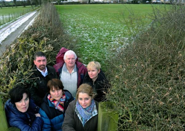 29/1/15 Local Residents who are opposing  the proposed housing development at Killinghall near Harrogate stood in one of the fields that will be built on .(GL1004/77c)