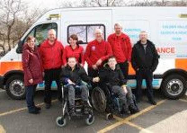Brothers Nathan, left, and Andrew with Calderdale Search and Rescue Team and mum and dad Joanne and Eldred Greenwood