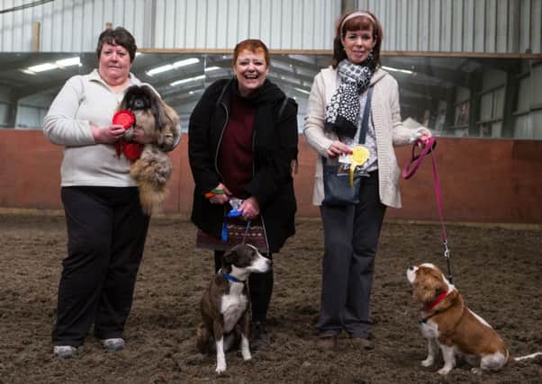 Pennine Animal Welfare (PAWS) fun day at Longfield Stables,Todmorden. Pictured are Catherine Aden and Polly, Julia Anderson and Tilly, and Maxine Higgins and Lady