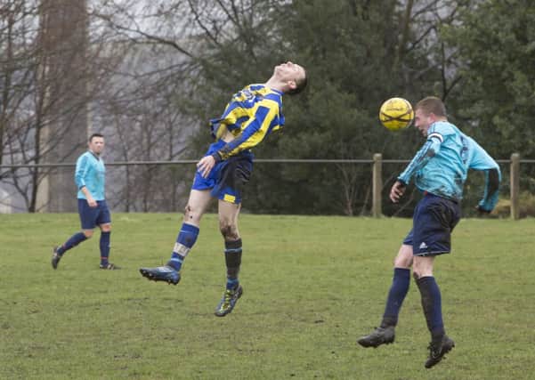 Sunday Football - Lee Mount (yellow and blue) v Carrington. Paul Fiander for Lee Mount and Liam Brook for Carrington