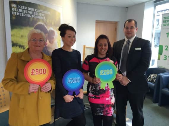 Elaine Chapman (The Faye Knowles Chapman Foundation), Toni Louise Cullen (SCARD), Ruth Duffy (Yorkshire Children's Centre) with branch manager Benjamin Merritt.
