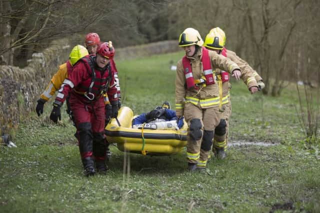 Fire service water rescue exersize at Mixenden Reservoir.