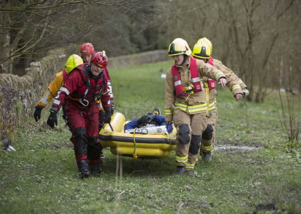Fire service water rescue exersize at Mixenden Reservoir.