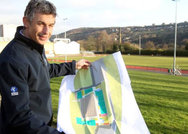 Martin Moorman, head of Ravenscliffe Hgh, with plans for new college, at Spring Hall, Halifax