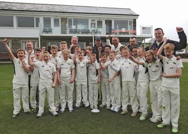 Former England cricket captain Andrew Strauss conducts coaching session for Stones under 11s