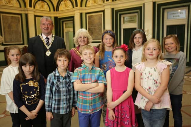 The Mayor of Calderdale Coun Pat Allen and Consort Robert Weeks with winners of the Calderdale 500 Words Competition.