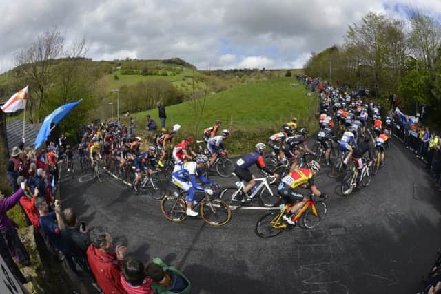 The peloton makes its way up Scapegoat  Hill out of Slaithwaite.
 PIC: Bruce Rollinson