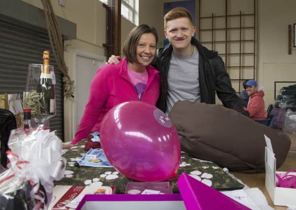Football Tournament and Family Fun Day for The Haven breast cancer support centre, at Todmorden High School. Coronation Street star Sam Aston with Abigail Marshall.