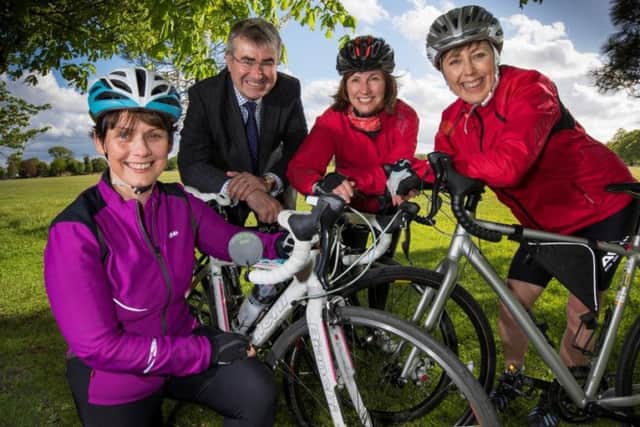 Cyclists (l to r) Colette Kon, Trudy Lennon and Sylvia Scullion, with legal entrepreneur Chris Newton. (S)