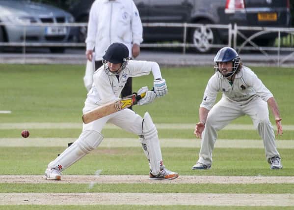 Harrogate's Connor Ryan at short leg watches a ball whistle past the bat (Caught Light Photography)