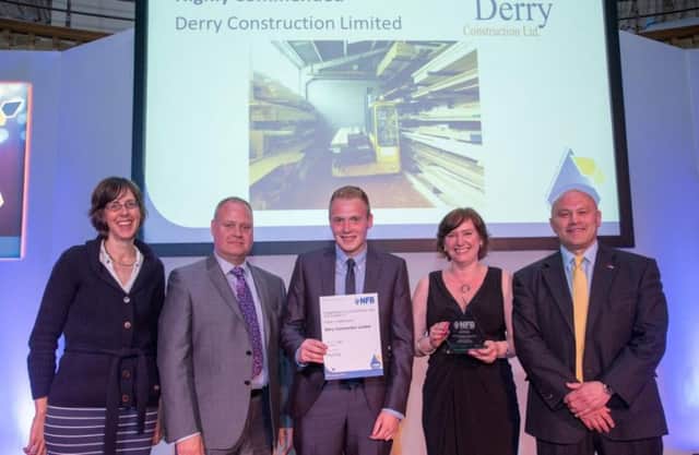 (L-R) Penny Simpson, Environment partner at sponsor Freeths LLP; director Shane Derry, apprentice Lewis Derry and Louise Kyle, all of Derry Construction Ltd; and Brian Moore, awards host and ex-England rugby team member. (S)