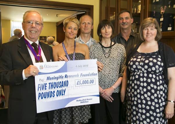 The Oddfellows present a cheque for £5,000 to the Meningitis Research Foundation in Memory of Beth Bowers. From the left, Beth's husband Trevor Bowers, Christine Etheridge from the Meningitis Research Foundation. David Bates, Lynn Bates, Derek Wood and Nicola Barraclough.