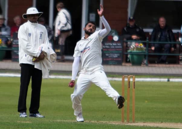 Actions from Todmorden v Haslingden at Todmorden CC. Pictured is professional Bilawhali Bhatti