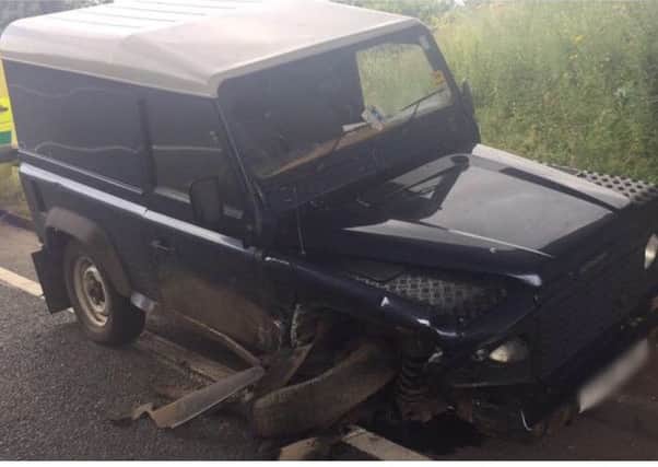 The Land Rover Defender after the two vehicle collision