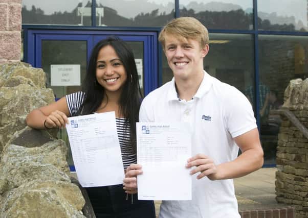 Year 12 students Mary Retirado and Oliver Williams, happy with their AS-level results at Calder High School, Mytholmroyd.