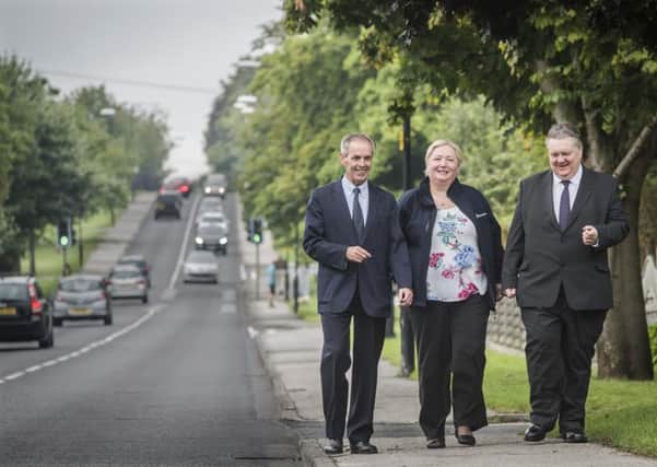 Coun Don Mackenzie (left) walks along the newly resurfaced Hookstone Chase with James Malcolm, area manager and Deborah Flowers, highways customer communications officer,  from the Harrogate highways office. (s)