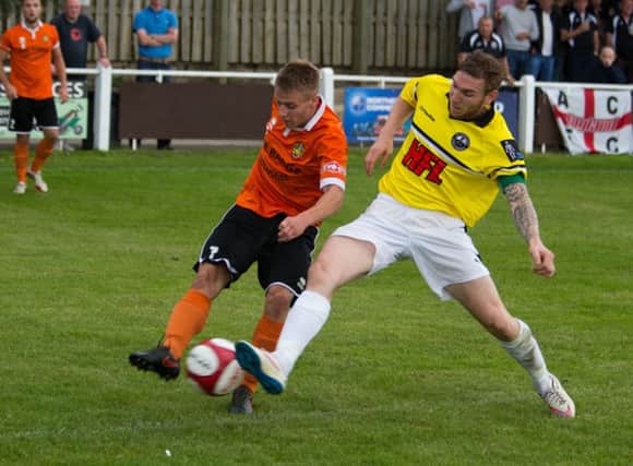 Actions from Brighouse Town v Atherton, FA Cup football at St Giles Road. Pictured is Ryan Hall