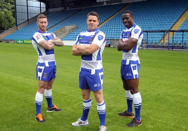 Fax players Lee Paterson, captain Scott Murrell and Rob Worrincy, all ready to play on the new turf at The Shay, Halifax.