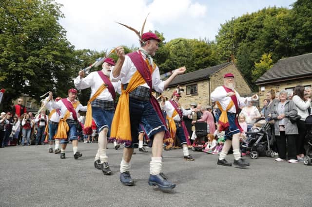 Sowerby Bridge Rushbearing Festival.  Wrigley Head Morris Men dance at St Patrick's Sacred Heart, Bolton Brow.