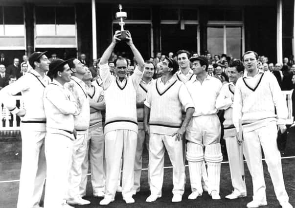 Brian Close holds the Gillette Cricket Cup trophy after winning in 1965.