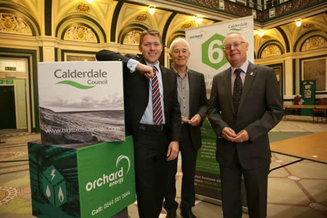 Gareth Henderson from Orchard Energy with Councillors Barry Collins and Tim Swift