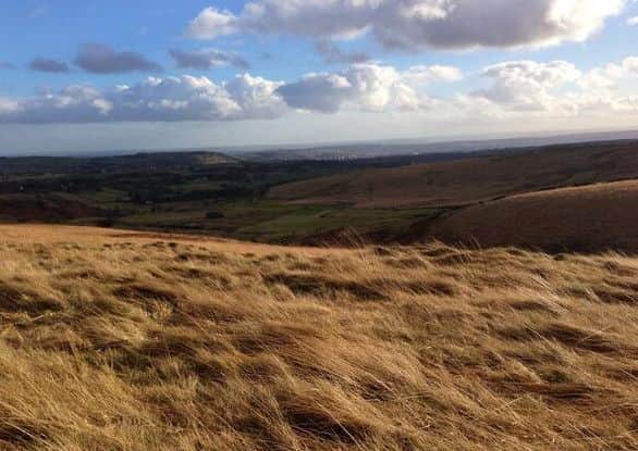 Picture send in via Twitter by Andy Hair of a blustery afternoon looking down into Halifax from Ovenden Moor.