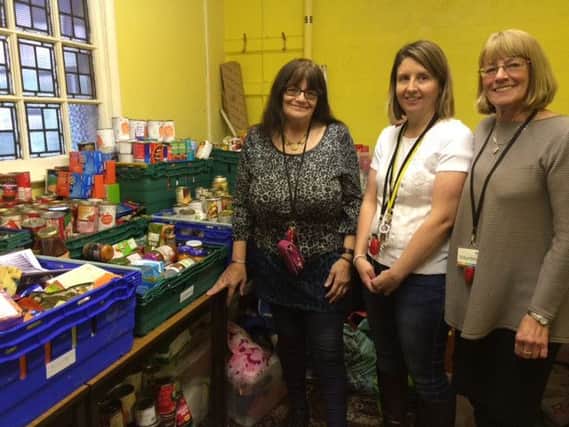 Pamela McNulty, Rebecca Snow and Rebecca Craven at the Brighouse Food Bank.