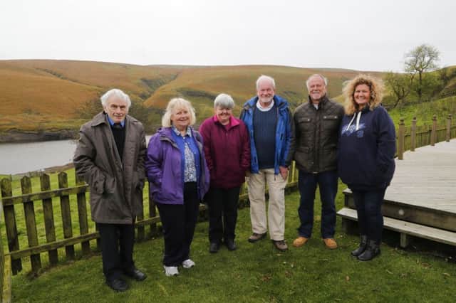 Anti-wind farm group at Clough Foot. From the left, David Sutcliffe, Sylvia Sutcliffe, Susan Kirk, Robert Finnerty, Stephen Bottomley and Viv Gilmore.