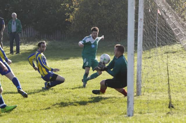 Sunday football - Bowling Green v Lee Mount. Lee Mount keeper John Pettifor saves a shot from Bowing Green's Gary Ash.