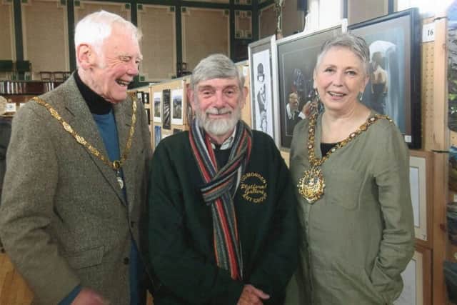 The Mayor of Todmorden, Coun Steph Booth, and her consort Tony Booth at Todmorden Art Group's annual open exhibition at Todmorden Town Hall - with Todmorfden Art Group chairman George Dobbs. Picture by Naomi Neil