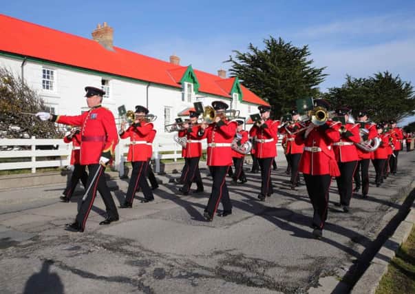 Tuesday the 21st of April 2015, Victory Green Stanley. Falkland Islands. Photograph Shows parade marking the queens birthday.The Parade consisted of marching detachments repersenting the Royal Navy, Army, Royal Air Force and Falklands Islands Defence Force accompanied by the Yorkshire Regimental Band. His Excellency the Governor, Mr Colin Roberts CVO took the Salute

For More more Information Contact:
J9 Media Photographer
British Forces Falklands Islands
BFPO 655
94130 6316
+50076316