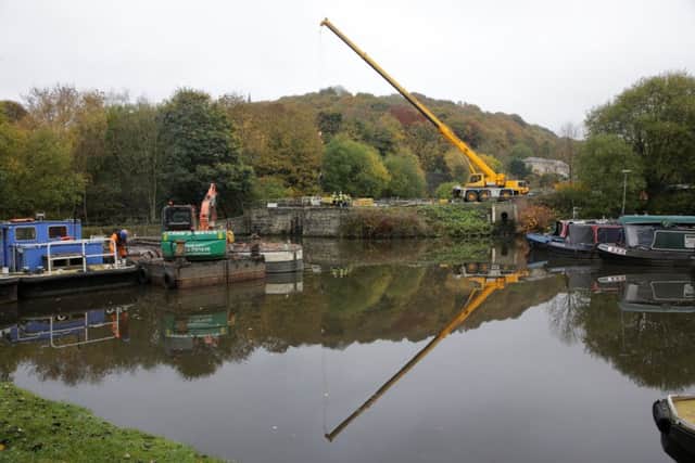 Work on new canal lock gates at Salterhebble.