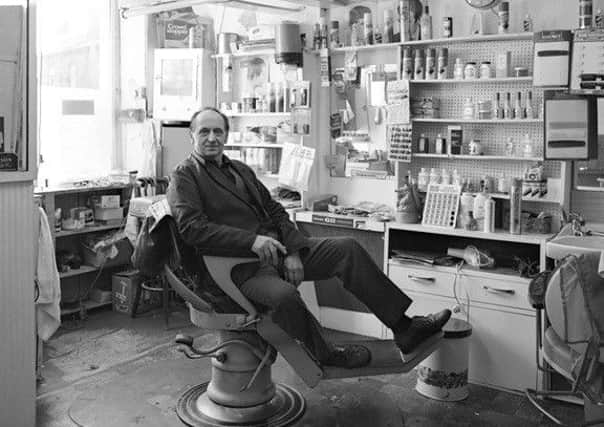 Copyright: Roger Birch

Carl Brown in his hairdressers shop

Photograph by Roger Birch, copyright, only to be used with permission, in conjunction with new book