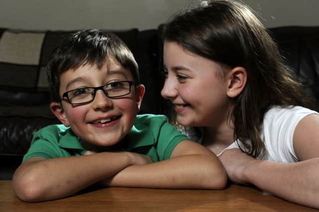 Thomas, 7,  and Beth Hale, 11, from Halifax.  Thomas had Retinoblastoma when he was a baby and they have been recognised by the Childhood Eye Cancer Trust which recognises the bravery of children who have been touched by eye cancer and are now  'CHECT Champions'.   Picture Bruce Rollinson