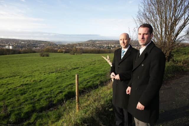 Councillors Howard Blagbrough and Scott Benton at greenbelt land off Thornhills Lane, Clifton.