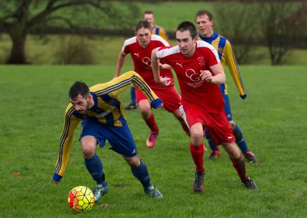 Actions from Greetland v Hebden Royd Red Star, at Greetland Goldfields. Pictured are Danny Dorward and Adam Dawson