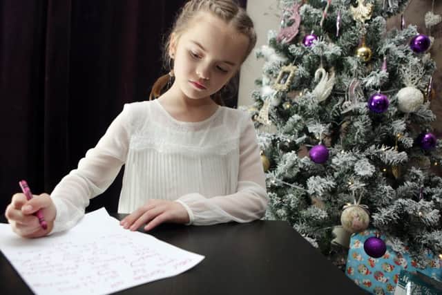 Isla Kerr, 7, has written to Santa Claus asking him to find her lost dog Dolly. Picture: Ross Parry Agency