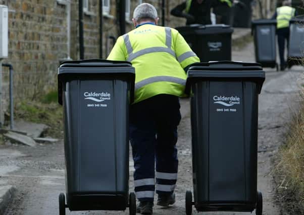 SUEZ staff collecting wheelie bins in Calderdale