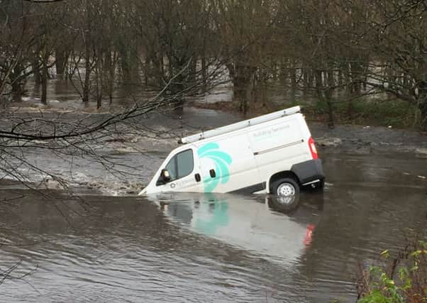 Flooding in Elland, by Matthew James