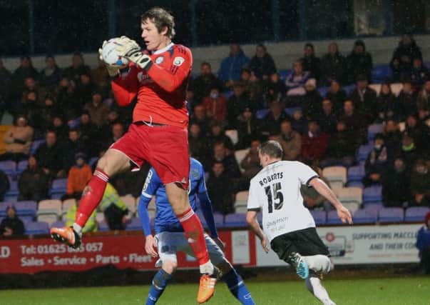 Sam Johnson in action against Macclesfield. Picture: Peter Hilton Photography