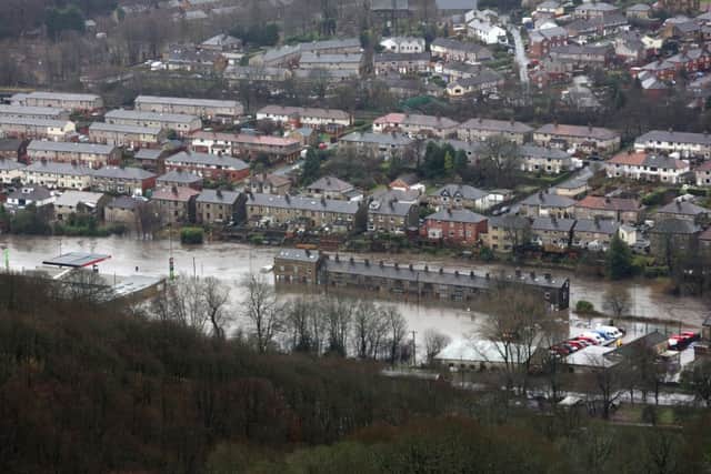Mytholmroyd centre under water after the River Calder burst in banks.